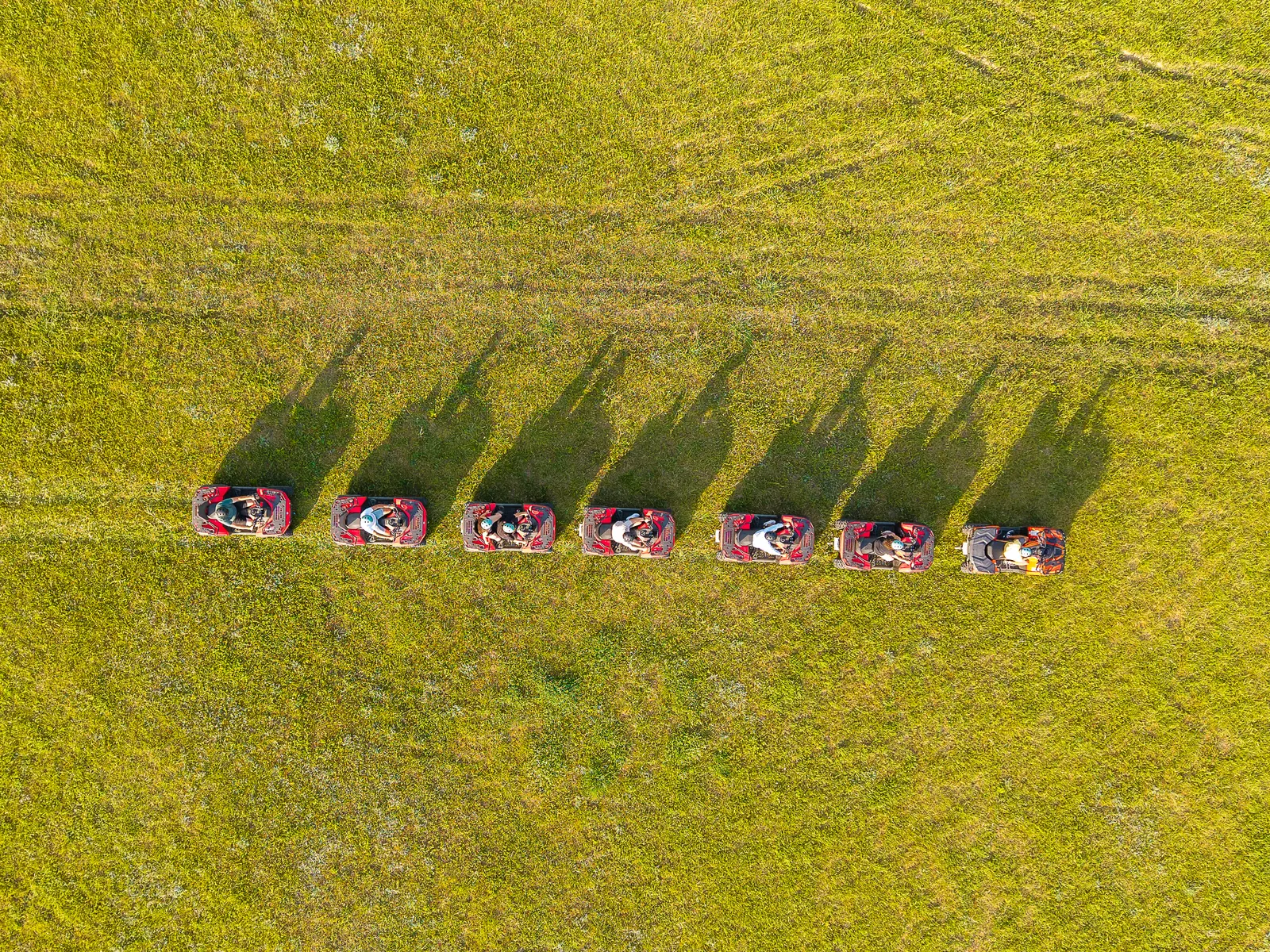Long evening shadows of the quad column, seen from above