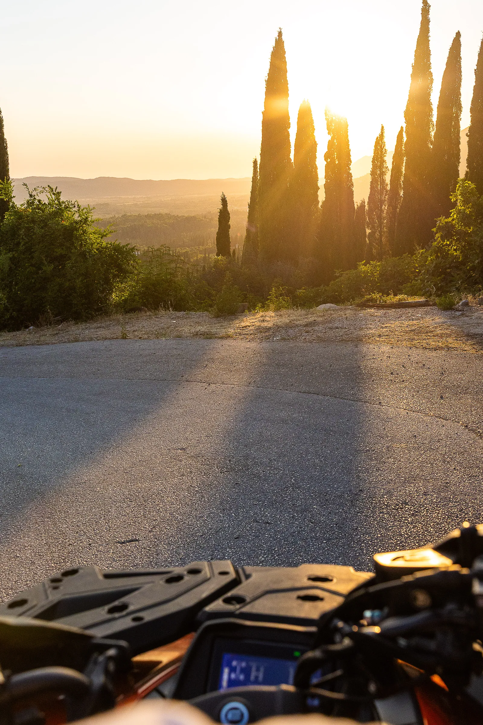Sunset over the Konavle valley seen from the handlebars of a quad